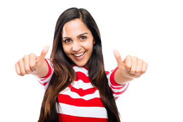 A pretty young girl giving a thums up sing in happiness as a sign of approval or yes isolated on a png background.