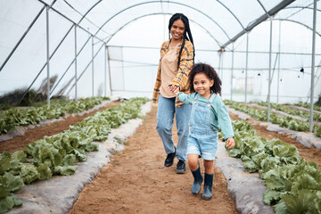 Poster - Agriculture, greenhouse and mother walking with girl for gardening, farming and harvest vegetables together. Black family, nature and happy child with mom on farm for growing plants, food and produce