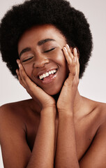 Canvas Print - Beauty, black woman and smile of a young African person face with hands happy about facial. Wellness, cosmetics and model relax in a isolated studio doing dermatology, detox and spa self care