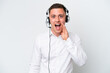© luismolinero - Telemarketer Brazilian man working with a headset isolated on white background with surprise and shocked facial expression