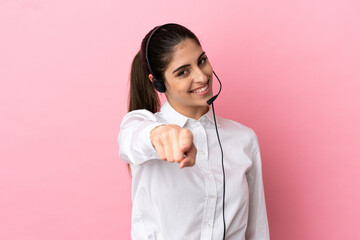 Poster - Young telemarketer over isolated background pointing front with happy expression