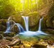 © Yuriy Kulik - small waterfall rushing over a stones, mountain canyon in sunlight