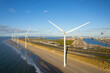 © Image Source - Windfarm on edge of basin to store polluted dredge