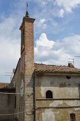 Wall Mural - Bell tower in the historic center of the ancient village of Chiusdino, Tuscany, Italy