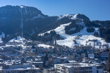 Fototapeta Londyn - View of Kitzbühel  in winter, with Streif and Hahnenkamm - Kitzbühel, Tirol, Austria