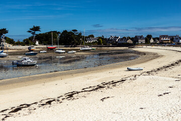 Wall Mural - Beach of Brignogan-Plages at low tide with many sailboats on ground, Brittany, France