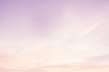 Wall Mural - Sky with soft and fluffy pastel lilac pink and blue colored clouds. Sunset background. Nature. sunrise. Instagram toned style