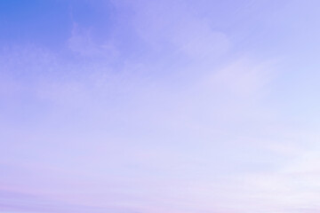 Wall Mural - Sky with soft and fluffy pastel lilac pink and blue colored clouds. Sunset background. Nature. sunrise. Instagram toned style