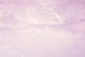 Wall Mural - Sky with soft and fluffy pastel pink and blue colored clouds. Sunset background. Nature. sunrise. Instagram toned style