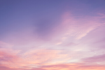 Wall Mural - Sky with soft and fluffy pastel pink and blue colored clouds. Sunset background. Nature. sunrise. Instagram toned style