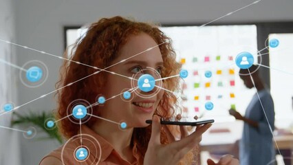 Poster - Animation of network of digital icons over caucasian woman talking on smartphone at office