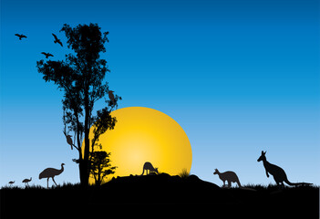 Wall Mural - Silhouette of Gum trees with yellow moon at sunset