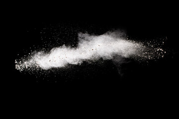 Wall Mural - White powder explosion cloud against black background. White dust particles splash.