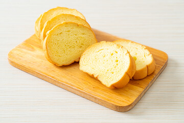 Wall Mural - potatoes bread sliced on wood board