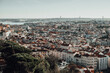© Cavan Images - Aerial panoramic wide angle view of Lisbon: tiled roofs, river