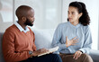 © Rene La/peopleimages.com - Mental health, therapy and counselling consultation with woman patient and psychologist. Person talking to man therapist writing notes about psychology, anxiety and depression or stress for help