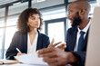 © Rene La/peopleimages.com - Planning, strategy and meeting black people or clients b2b documents, finance review and contract discussion. Accountant, financial advisor or business employee with partner investment at USA company