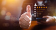 © thanmano - Businessman give five star with excellent experience rating review on virtual screen by touching happy face icon