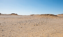 Barren Desert Landscape In Hot Climate With Rocky Scenery