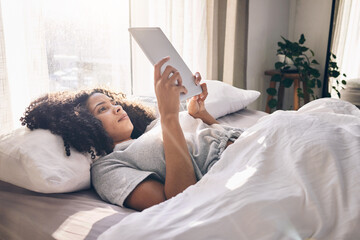 Canvas Print - Relax, tablet and black woman in bed in bedroom for social media, texting or internet browsing in the morning. Technology, home and female with digital touchscreen for web scrolling after waking up.