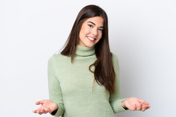 Wall Mural - Young Brazilian woman isolated on white background happy and smiling