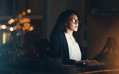 Poster - Office, business and black woman on computer for research, project management and online at night. Corporate manager, vision and female worker working late on strategy, planning and reading website