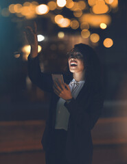 Phone, night stars and black woman outdoor checking galaxy and solar system on app. Happy, smile and young person in city pointing to star constellations at night with cellphone and web connection