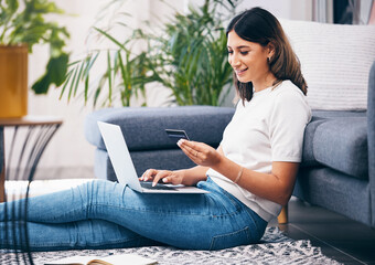 Poster - Credit card, online shopping and woman on laptop, banking and fintech for easy payment on home carpet. Young person or student with computer for e commerce sale, finance and wealth in her living room