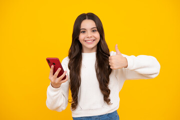 Canvas Print - Teenage girl with smart phone. Portrait of teen child using mobile phone, cell web app. Happy face, positive and smiling emotions of teenager girl.