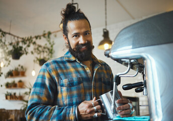 Portrait, man and barista with machine, smile and confidence with small business, worker and skills. Face, Indian male employee and entrepreneur making coffee, cafeteria and manager for restaurant