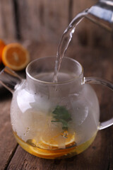 Poster - Sbiten, a drink with lemon, mint and honey in a glass teapot