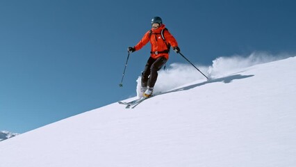 Sticker - Super slow motion of free ride skier in powder snow. Filmed on high speed cinema camera, 1000fps.