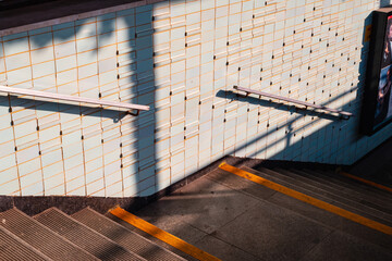 Wall Mural - Steps and shadows going into train station in Debrecen Hungary 