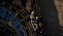 Skeleton Figure That Represents Death, Striking The Time At The Prague Astronomical Clock Or Prague Orloj Attached To The Old Town Hall In Prague, Czech Republic. 4K Resolution.