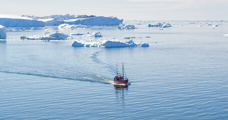 Wall Mural - icebergs and tourist boat in greenland iceberg landscape of ilulissat icefjord