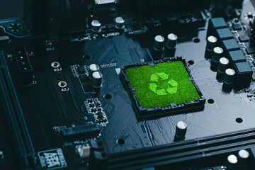 Concept of green technology. green recycle sign on circuit board technology innovations. Environment Green Technology Computer Chip.Green Computing, Green Technology, Green IT, CSR, and IT ethics