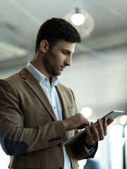 Aufkleber - Technology, internet and businessman with tablet reading email, sales or social media on web. Research, leadership and company ceo networking with online communication in management at startup office