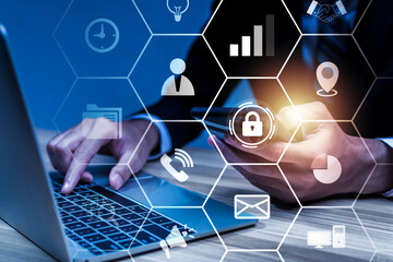 Wall Mural - Network Security. businessman hand working on laptop computer with virtual graphic business data information diagram, internet security, network connection, financial, digital technology concept