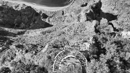 Poster - Tourists enjoy the viewpoint at Cabo Girao, along the Madeira coastline, Portugal. Aerial view from drone