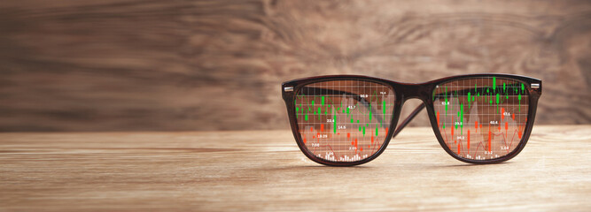 Wall Mural - Stock market statistics on eyeglasses. Forex trading analysis