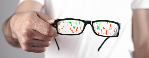 Wall Mural - Stock market statistics on eyeglasses. Forex trading analysis