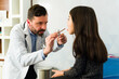 © AntonioDiaz - Caucasian doctor doing a medical examination of a little girl