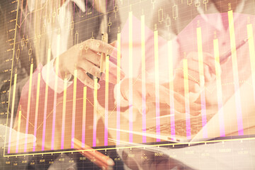 Poster - Multi exposure of man and woman working together and financial chart hologram. Business concept. Computer background.