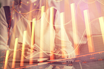 Poster - Double exposure of businesswoman hands typing on computer and financial graph hologram drawing. Stock market analysis concept.