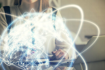 Fototapete - Multi exposure of woman hands typing on computer and business theme hologram drawing. Success concept.