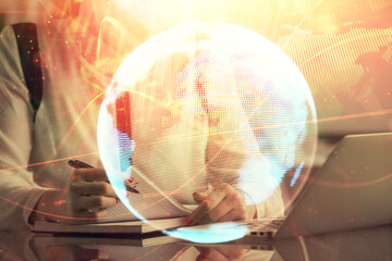 Fototapete - Multi exposure of woman hands typing on computer and business theme hologram drawing. Success concept.