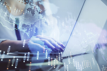 Poster - Double exposure of woman hands typing on computer and financial graph hologram drawing. Stock market analysis concept.