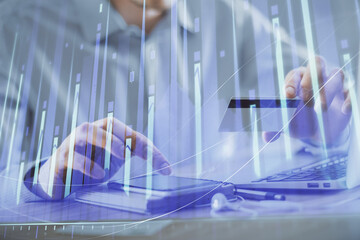 Poster - Double exposure of man hands holding a credit card and Forex graph drawing. Stock trading and digital fintech in Internet E-commerce concept.