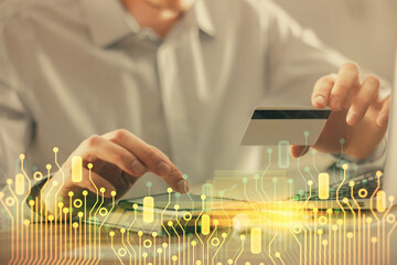 Poster - Double exposure of man hands holding a credit card and data theme drawing. E-commerce and technology concept.