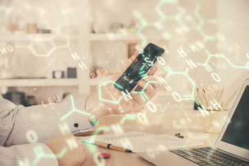 Poster - Double exposure of man's hands holding and using a phone and formulas drawing. Education concept.